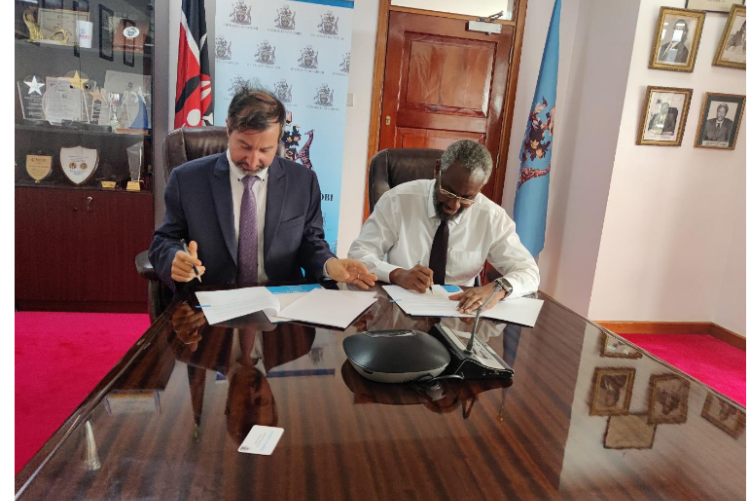 The Vice-Chancellor of the University of Nairobi is Prof. Stephen Kiama (Right). IFPRI Country Program Leader, Kenya Dr. Clemens Breisinger (Left), signing the MOU Photo credit:  Directorate of Corporate Affairs, University of Nairobi